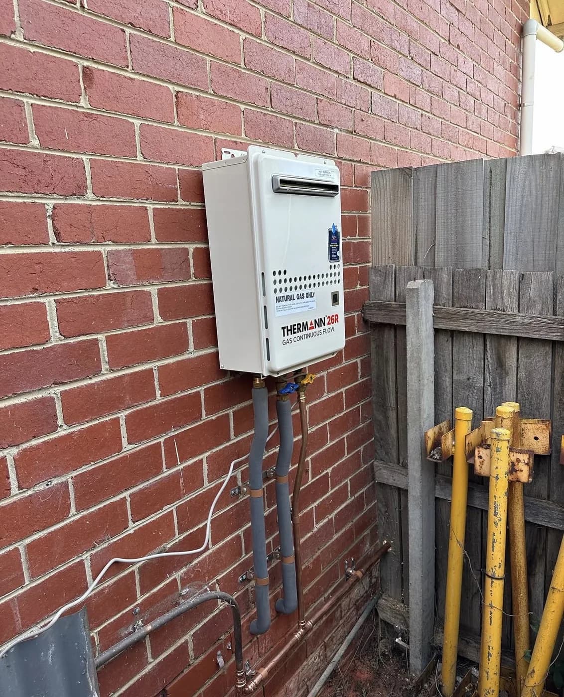 New continuous flow gas hot water system after replacement